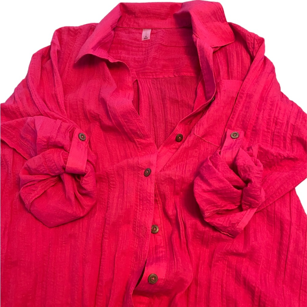 Mynah pink long button up shirt.